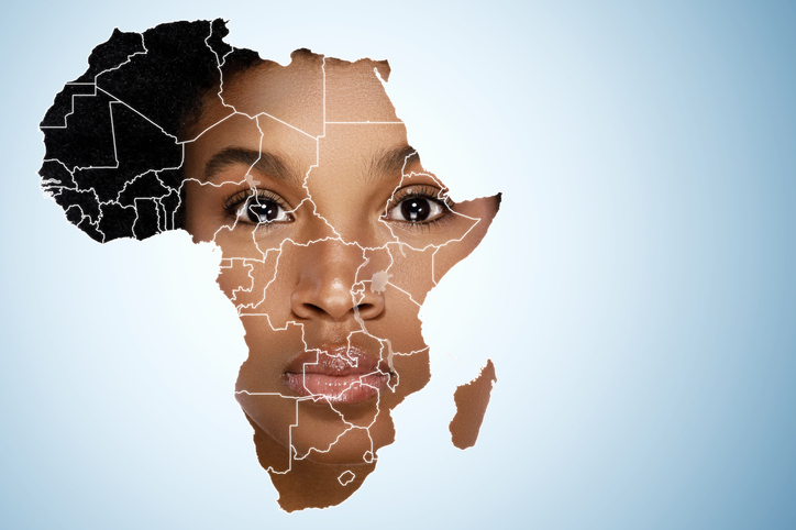 Face of African woman inside the map of Africa