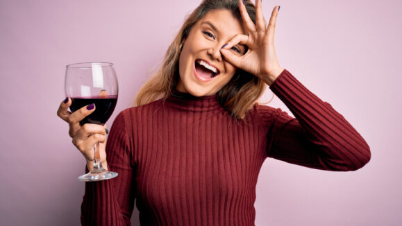 Young,Beautiful,Blonde,Woman,Drinking,Glasse,Of,Red,Wine,Over